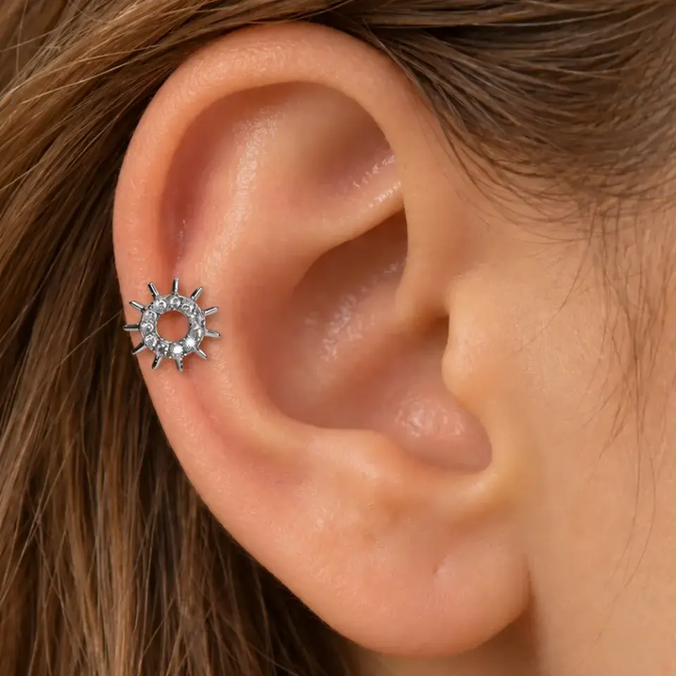 dumen-tragus-piercing