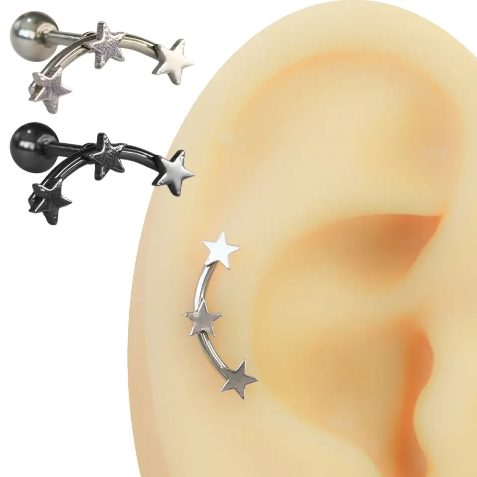Kavisli çelik bar üzerinde yan yana üç adet yıldız figürü bulunan siyah ve gümüş renk seçenekli piercing modeli.