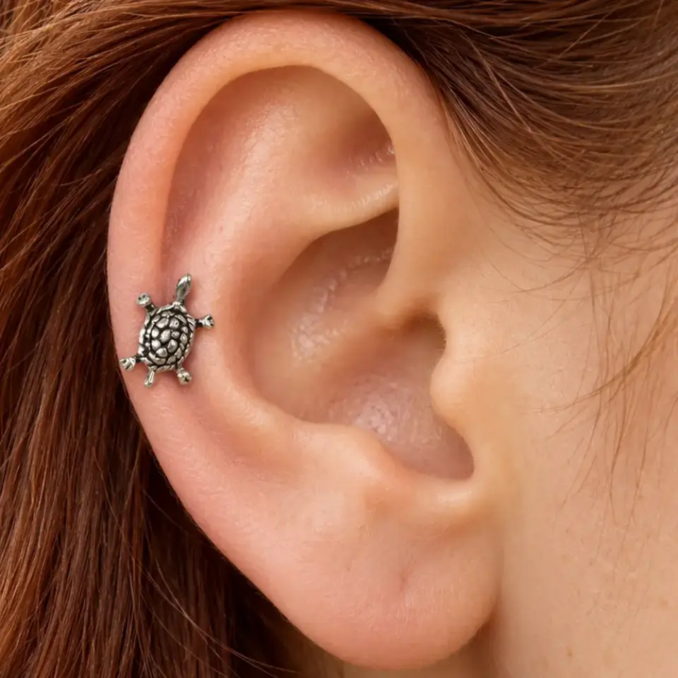 kaplumbaga-helix-piercing
